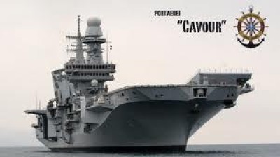Fermiamo la portaerei Cavour che gira il mondo a vendere armi italiane.