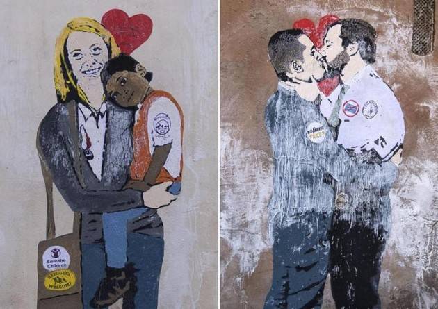 Lugi Di Maio bacia Matteo Salvini e Giorgia Meloni  porta in braccio un bimbo di colore